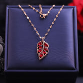 red gemstone leaf pendant necklace