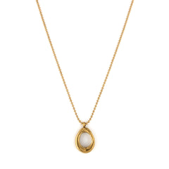 A gold-colored necklace with a uniquely sculpted open-circle pendant on a delicate beaded chain.