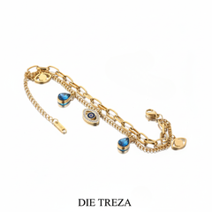 Gold bracelet with charms on a white background, featuring the brand 'DIE TREZA'.