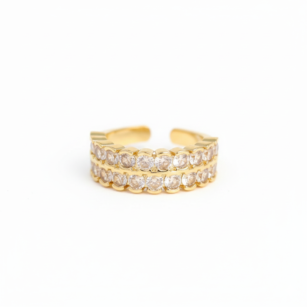 Gold and diamond ring on a white background