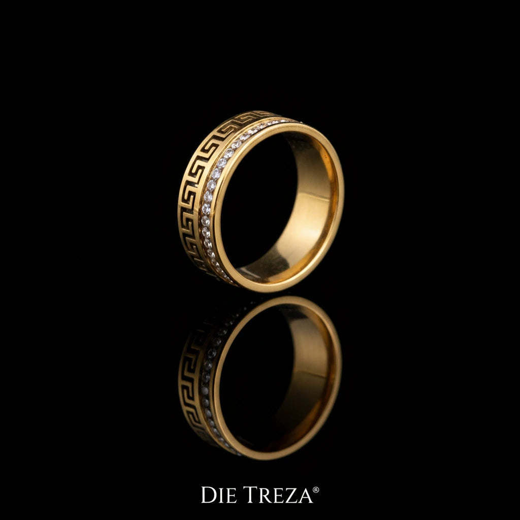 Gold ring with intricate design on a black background, featuring the brand 'Die Treza'.