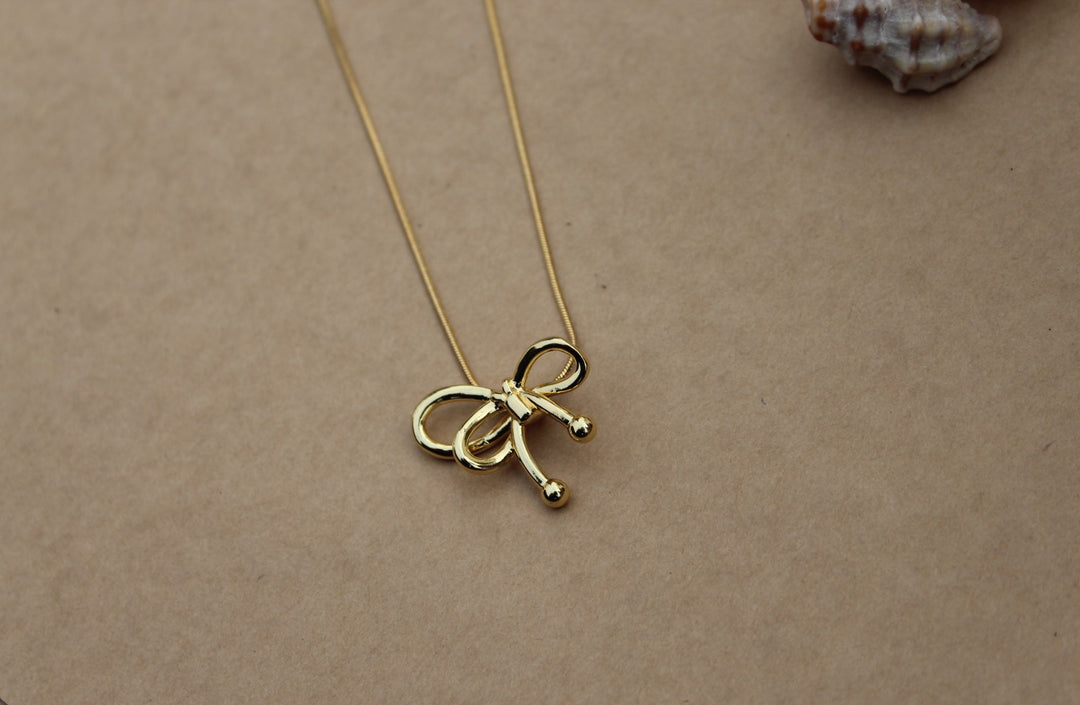 Golden Belle Bow Pendant